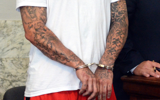 Illustration for article titled Aaron Hernandez's Tattoos May Contain Clues To Murders